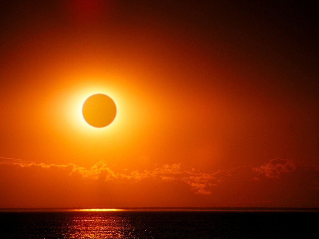 solar eclipse by the sea Imaginação Fértil